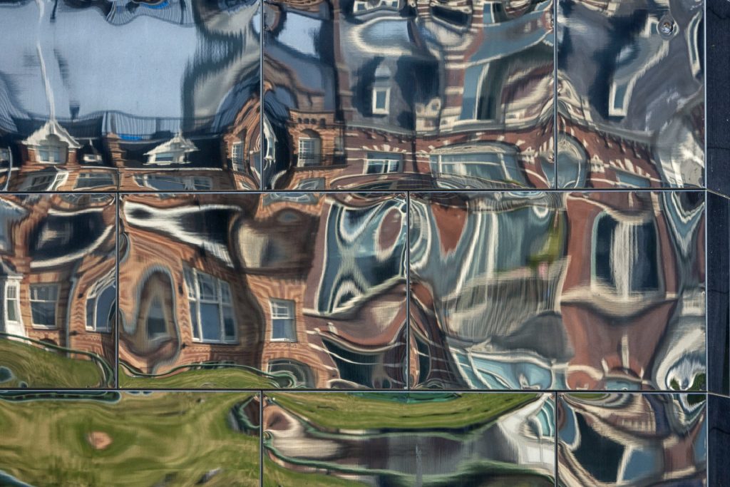 A distorted reflection of a house, taken by János Szüdi