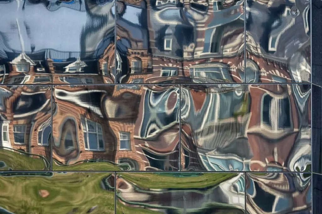 A distorted reflection of a house, taken by János Szüdi